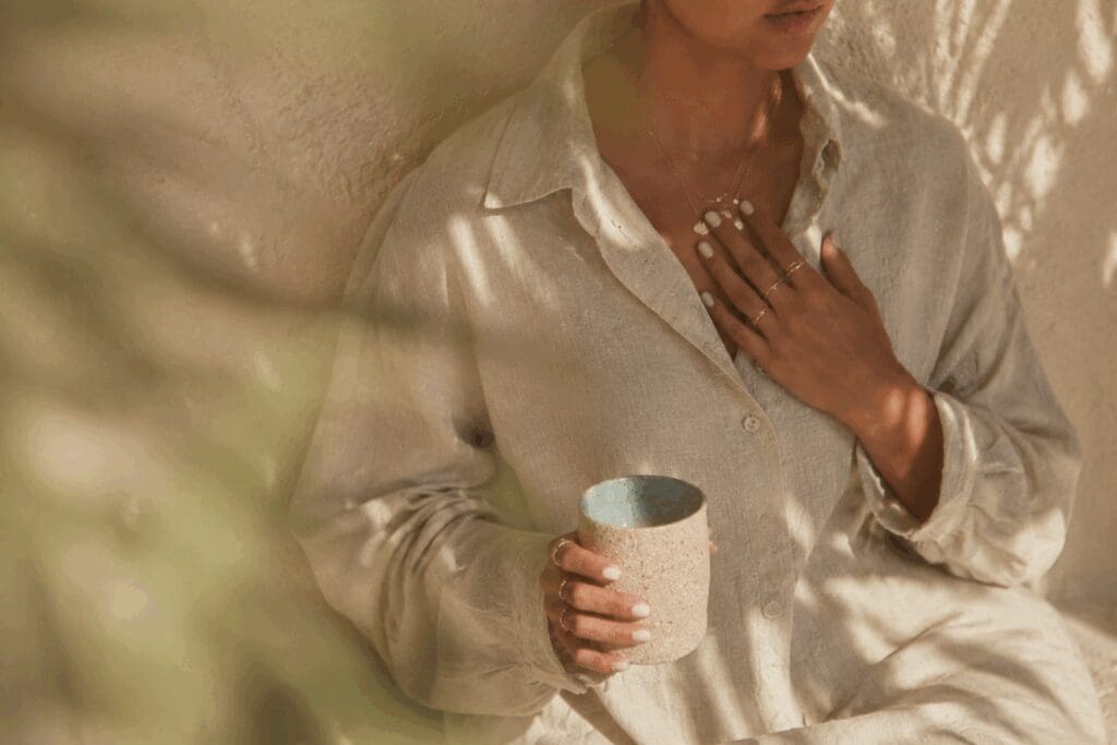 Woman practicing curiosity toward the parts behind overthinking and self-doubt.