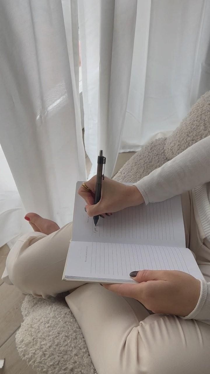 3 Practices to Real Alignment: woman journaling and reflecting on her growth
